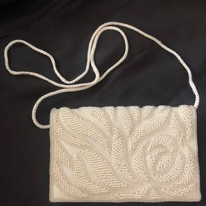 Pearl beaded white clutch